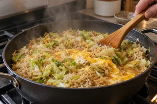 Rice and cabbage simmering together in one pan